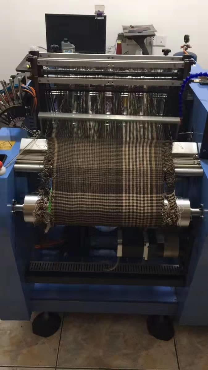 image of a woolen machine